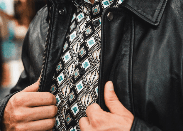 Salinas Charreria embroidered western shirt under a leather jacket
